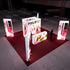A top-down perspective of the booth, displaying its structure with lighted walls and counters adorned with cosmetic product imagery and floral patterns. A professional figure is seen walking around the setup.